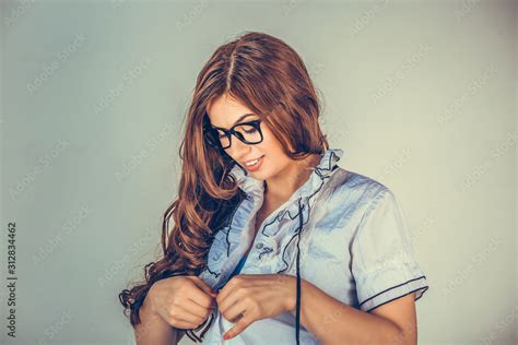Sexy Woman Undressing Herself Looking Sexy And Flirty Stock Photo Adobe Stock