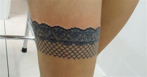 stocking tattoo on the right thigh
