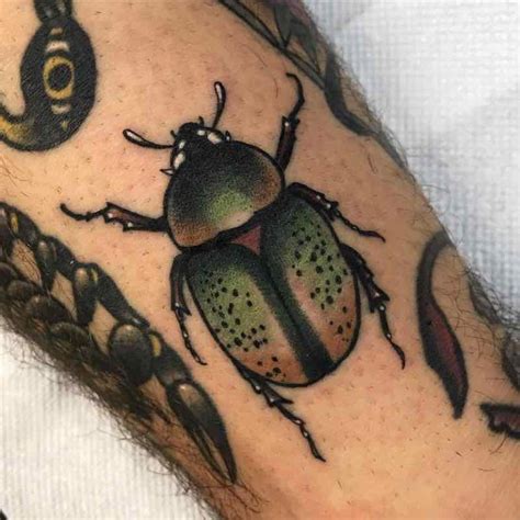 25 Of The Best Unique Beetle Tattoos Tattoo Insider Beetle Tattoo