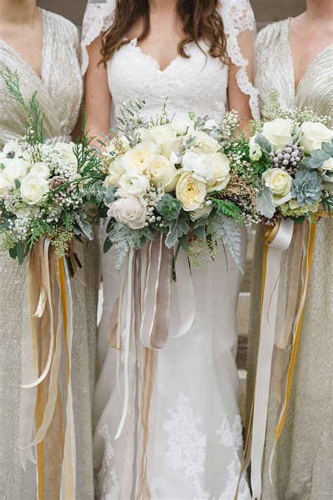 The elegant pink and ivory bouquet shown above includes a classic combination of roses, calla lilies and stock. White Winter Wedding Bouquets with Ribbon