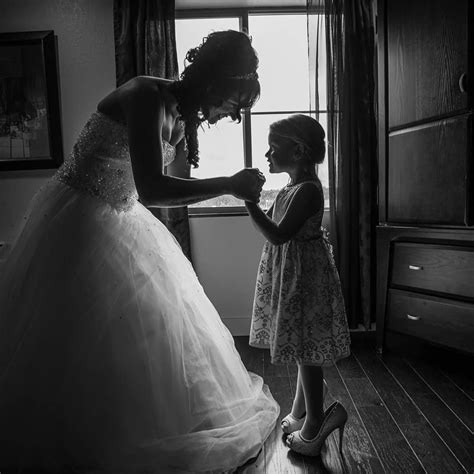 sharing a precious moment right before walking down the aisle metropolisweddings we love this