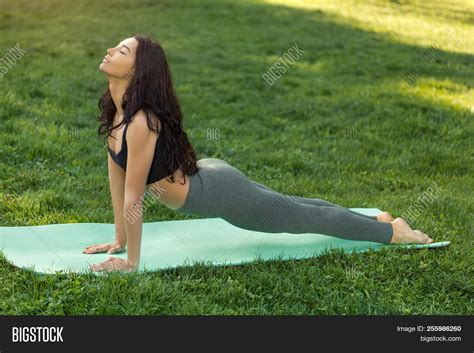 Woman Practicing Yoga Image Photo Free Trial Bigstock