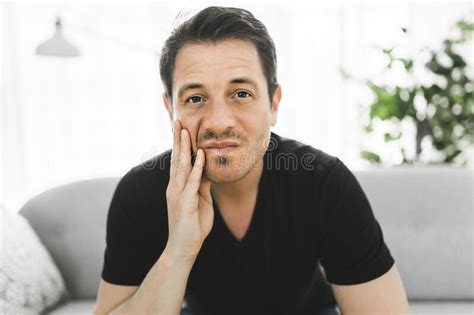 Depressed Man Thinking At Home On Couch Stock Image Image Of Stress