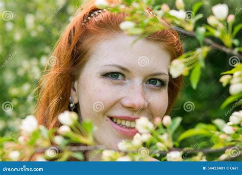 beautiful red haired girl walks in apple orchard stock image image of dress color 54423401