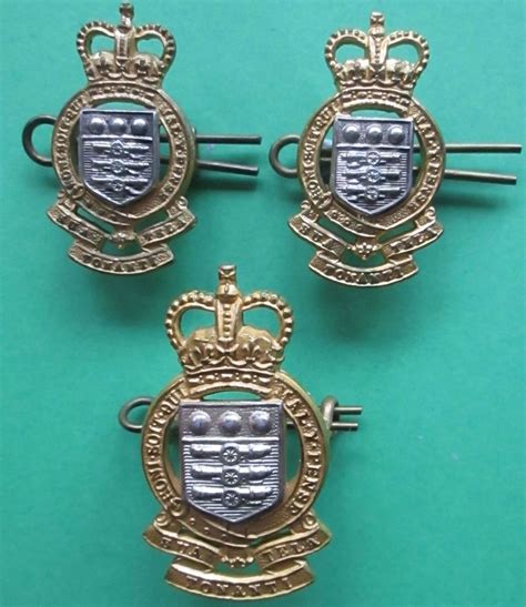 A Set Of Officers Royal Army Ordnance Corps Badges In Officers Silver