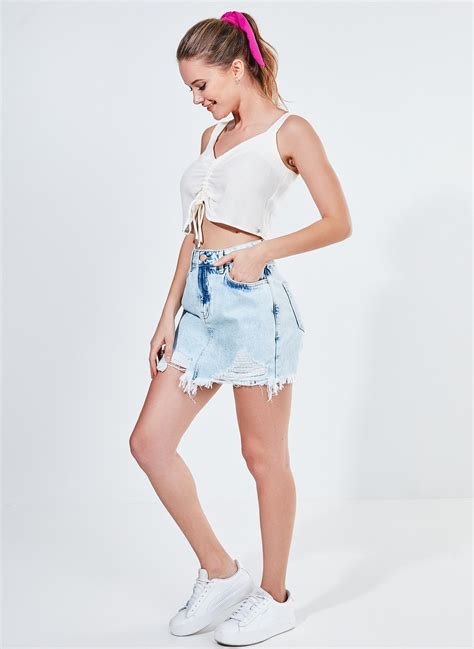 Short Saia Em Jeans Com Rasgos Youcom Vem Cá Conferir Suas Peças Favoritas