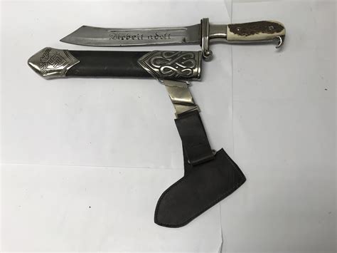 A Replica German Ww2 Rad Hewer Dagger With Scabbard Leather Hanger And