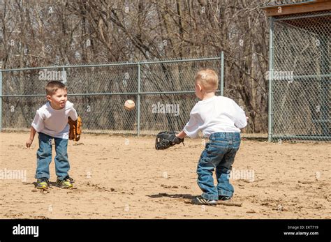 Two Boys Play Catch Throwing Ball Stock Photo Alamy