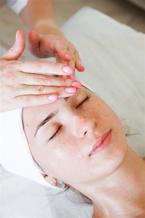 Pretty Yanog Woman Receiving Face Massage Closeup Photo Stock Image Image Of Female