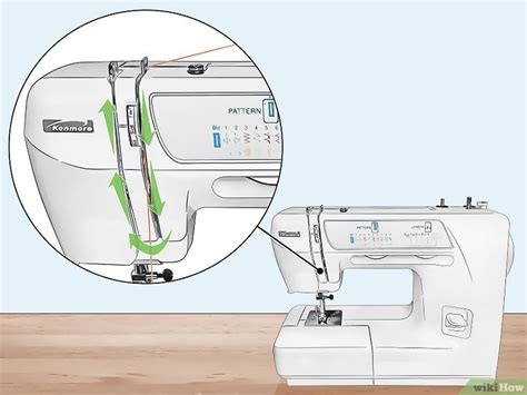 Cómo colocar el hilo en una máquina de coser Kenmore