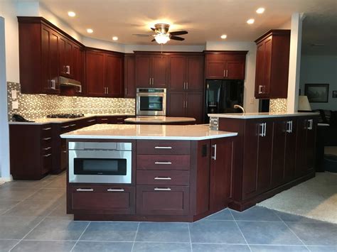 Bay area cabinetry is an american company founded by european engineers and manufacturers with 25 years of experience. Bright kitchen with dark cabinets and white countertops ...