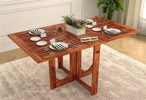 It looks marvelous in a combination of stone and metal. Buy Paul Foldable Dining Table (Honey Finish) Online in ...