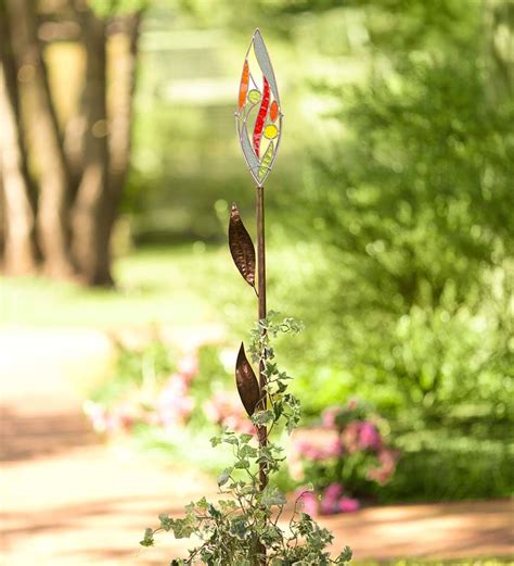 Some flower bulbs can be shipped to you at home, while others can be picked up in store. Stained Glass and Metal Flower Garden Stake | Wind and Weather