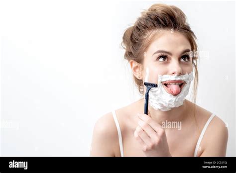 Beautiful Young Caucasian Woman Shaving Her Face By Razor On White Background Pretty Woman With