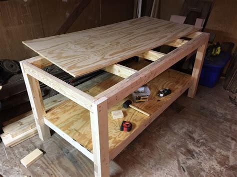 These blocks keep the top secured within the carcase. How to build a woodworking workbench and tablesaw outfeed ...