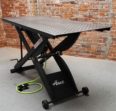 The large aluminum top makes the table both durable and portable. Variable Height Welding Tables - HMC Industries ...