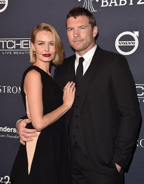 Sam Worthington Wears A Statement Hoodie Next To Wife Lara At The Australians In Film Awards In