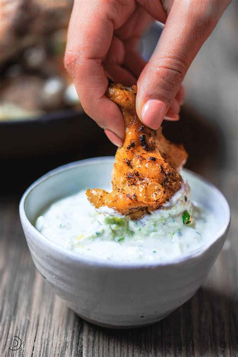 After parboiling, remove the chicken pieces from the pot of boiling water, using tongs and place them on a pan or a dish. yogurt sauce for chicken wings