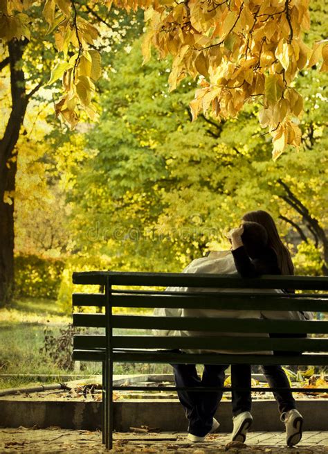 Romantic Couple Sitting In The Autumn Park Stock Image Image Of