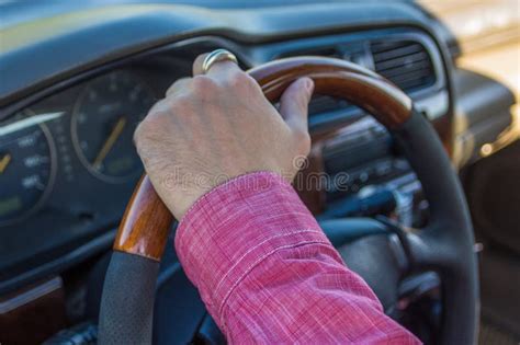 Man S Hand On The Steering Wheel Inside Of A Car Stock Photo Image Of