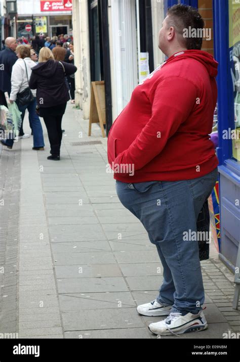 Obese Man In Street In Town In Pembroke Wales Stock Photo Alamy
