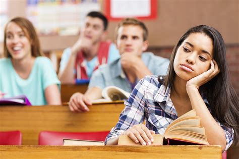 Bored Student At Desk With Classmates In Background Wells Fargo Blogs