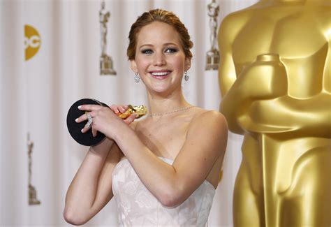 13 Pictures Of Jennifer Lawrence Laughing Off Her Oscars 2013 Fall