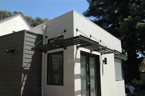 A door canopy is the perfect way to add some interest to your front door. Pin by Community. A Design Collective on Personal: New ...