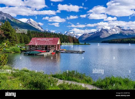 The Maligne Lake Boathouse With Reflection On Maligne Lake Jasper