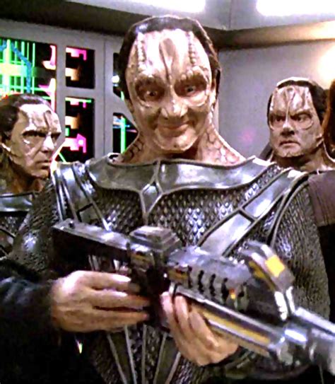 This is cracking me up. Garak looks way too pleased to have that weapon ...