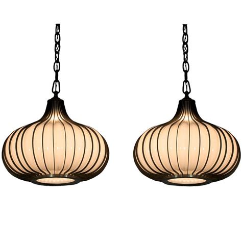 Another popular option is pendant lighting to create a statement in your space. Mid Century Modern Pendant Ceiling Light at 1stdibs