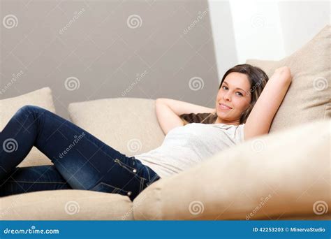 woman relaxing on the couch stock image image of girl relaxing 42253203