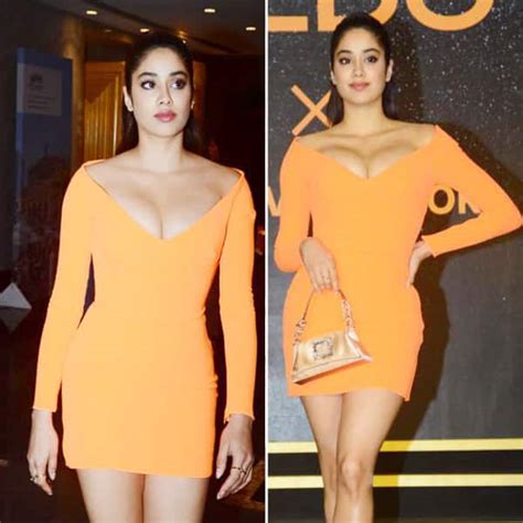Janhvi Kapoor Shows Off Ample Bosom In A Body Hugging Orange Dress And