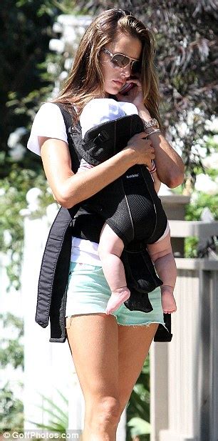 Alessandra Ambrosio Wriggles Into Tiny Aqua Shorts During Day Out With