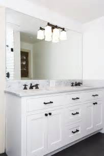 Custom White Cabinets With Pental Quartz Countertops Bathroom
