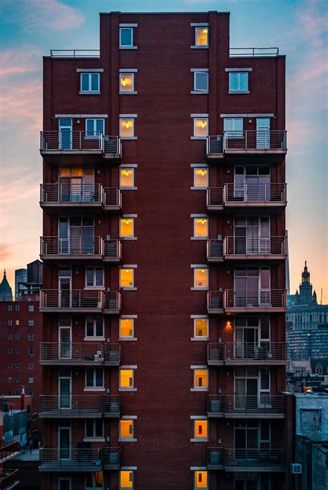 High Rise Building With Balconies During Day Photo Free Home Decor