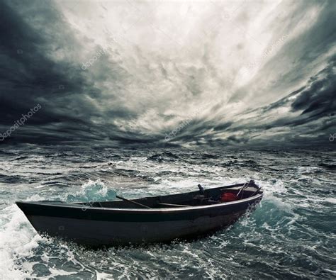Abandoned Boat In Stormy Sea Stock Photo By ©nejron 12374477