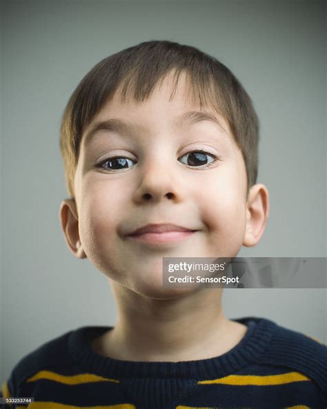 Portrait Of A 4 Years Old Boy With Happy Expression High Res Stock