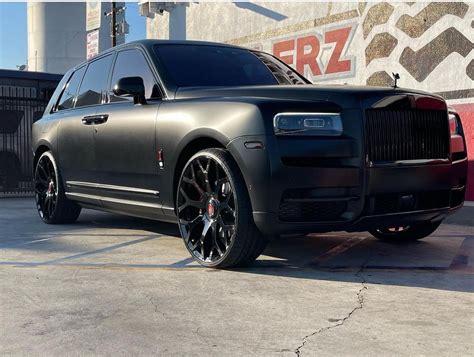 Satin Black Badge Rolls Cullinan Floats On Forgiato 26s Rocks Red