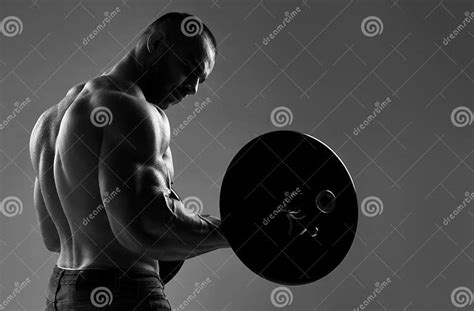 Muscular Strong Well Built Men Bodybuilder Weightlifter Does Exercises