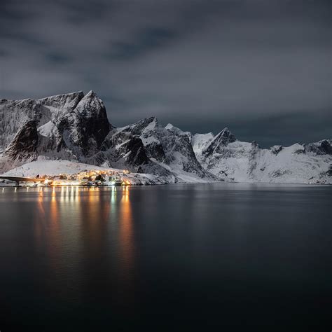Village Lights Shine On Moonlit Winter Night Near Reine Moskenesøy