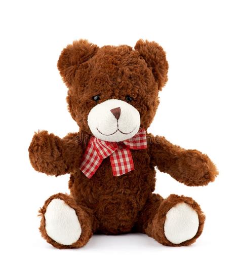 Teddy Bear With A Red Bow On His Neck Isolated On A White Background