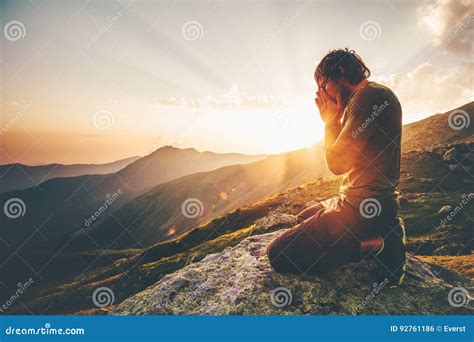 Man Praying At Sunset Mountains Stock Photo Image Of Enjoy Landscape