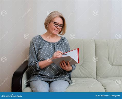 Portrait Of A Beautiful Well Groomed Pensioner 50 60 Years Old In The Room Stock Image Image