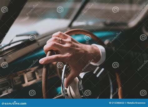 Men S Hands On The Steering Wheel Inside A Retro Car Stock Image