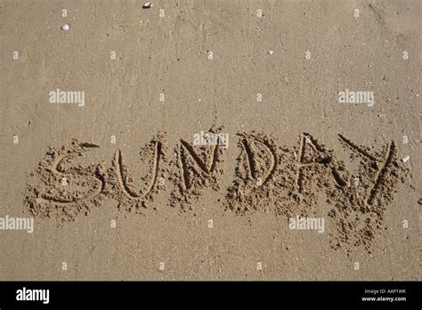 Sunday Written On Sand Weekdays Stock Photo Alamy