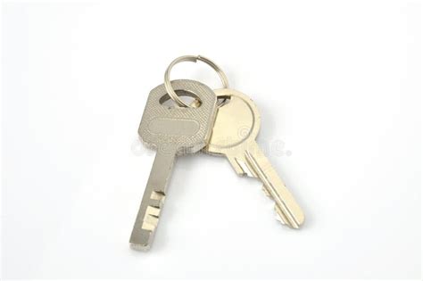 Silver House Key Lying On A Contract Of House Sale Stock Photo Image