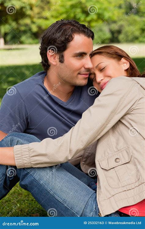 Woman Resting Her Head On Her Friend S Shoulder With Her Eyes Close