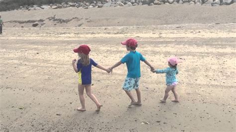 Cousins Walk The Beach At Low Tide YouTube