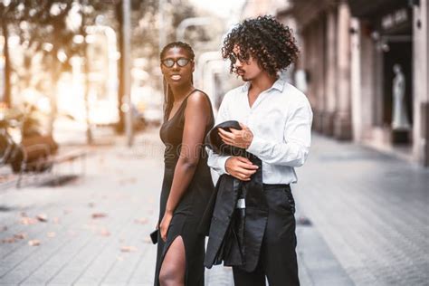 An Interracial Couple Of Friends Outdoors Stock Image Image Of